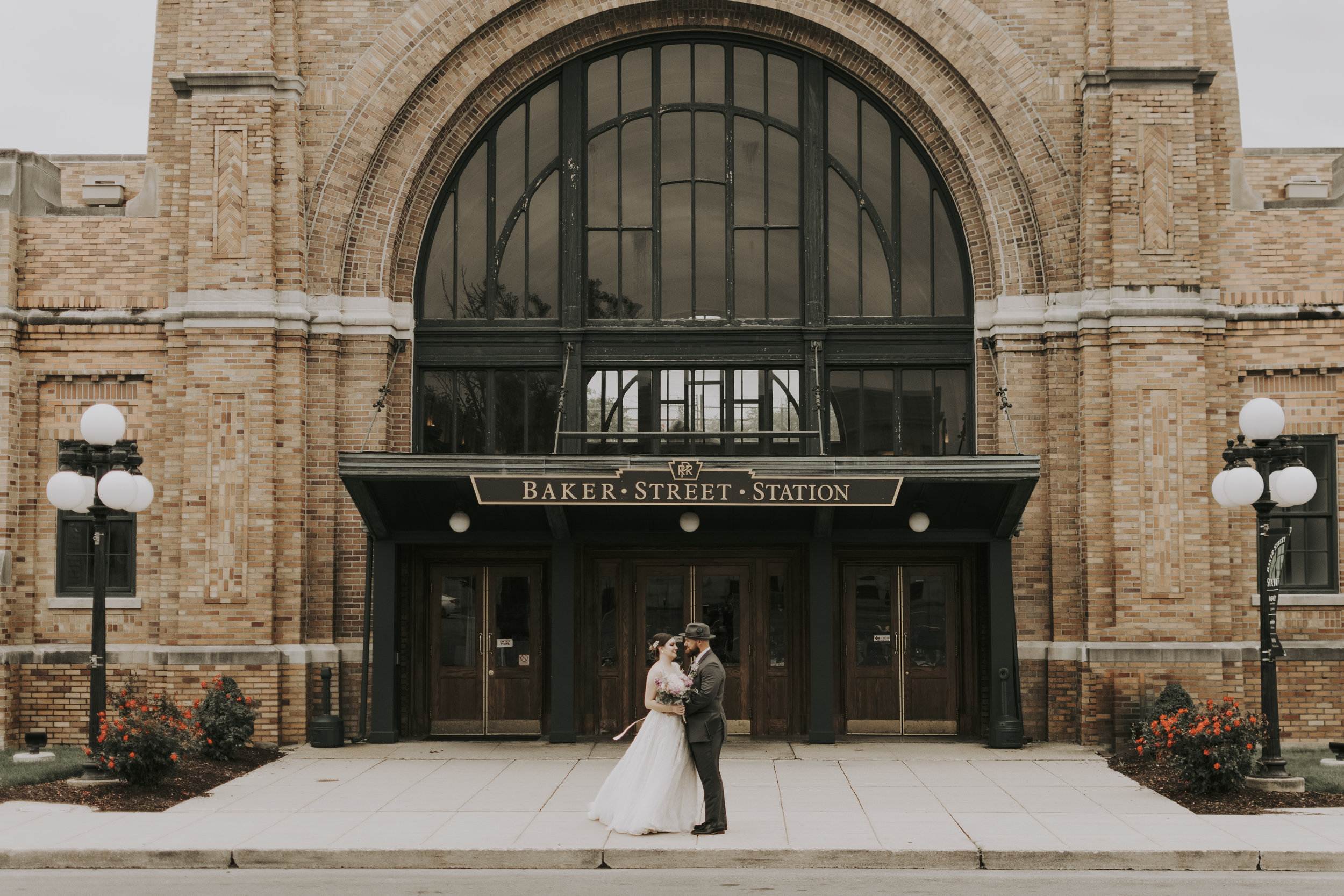 couple outside the Baker Street Station wedding venue in Fort Wayne