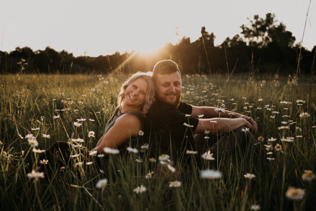 engagement photos in field of flowers