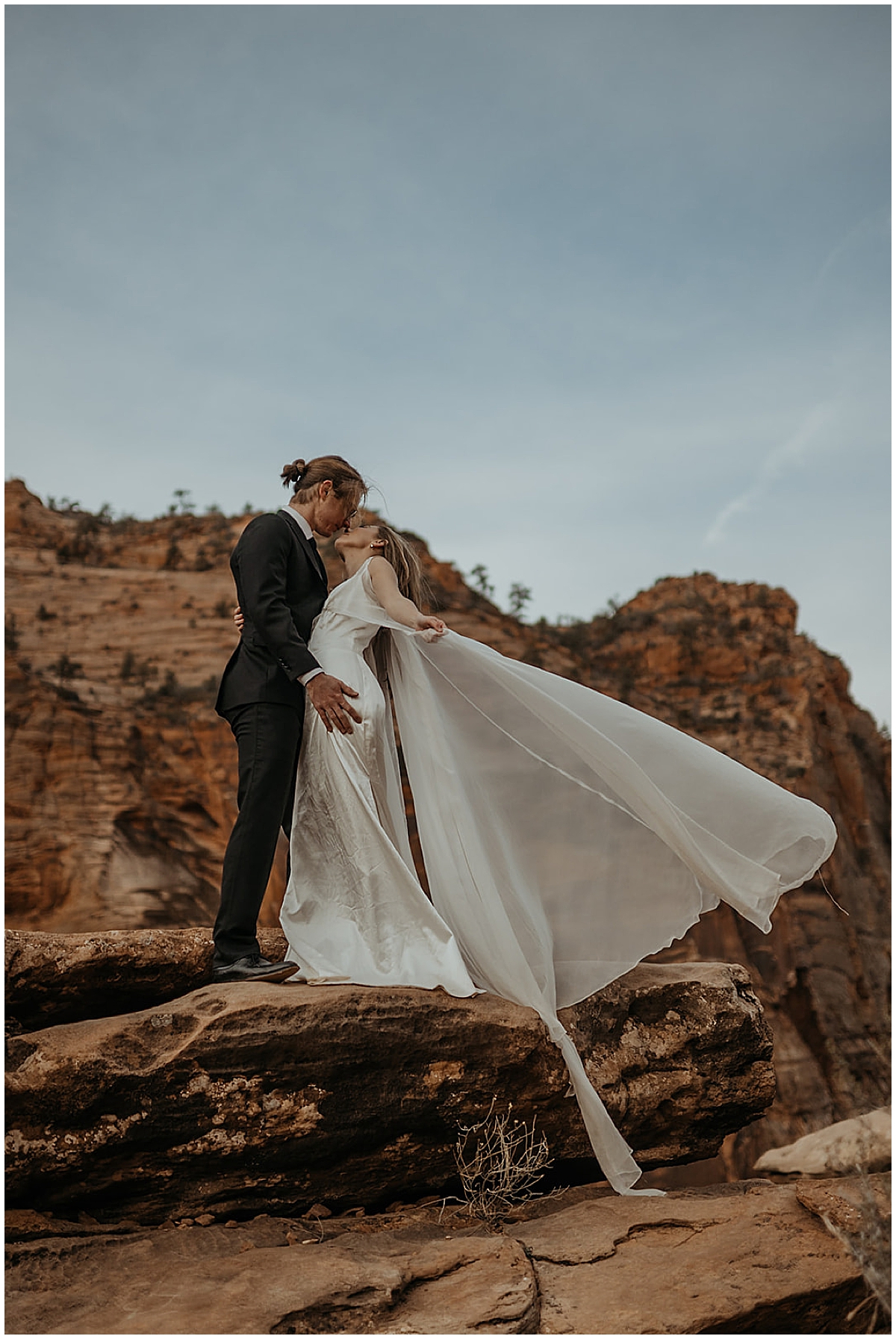 Bridal portraits with autumn and cole in zion national park taken by Kim Kaye Photography