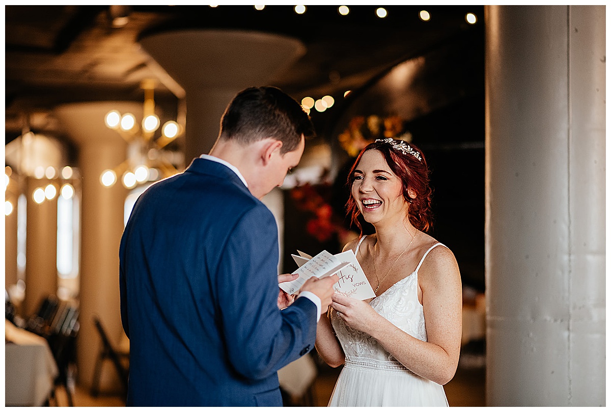 Bride and Groom sharing their vows privately in an industrial venue.