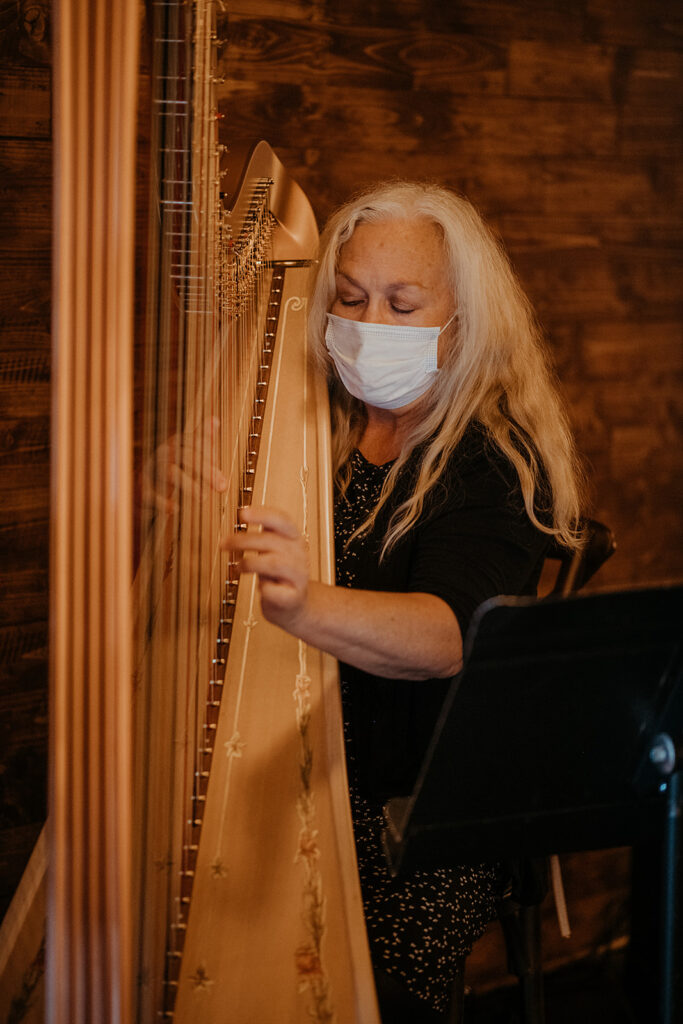 Harpist playing during wedding ceremony