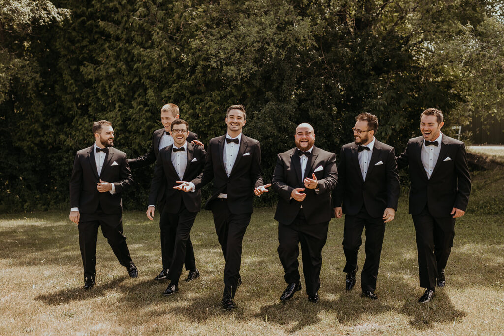 Groom and groomsman photos at Castle Farms in Charlevoix