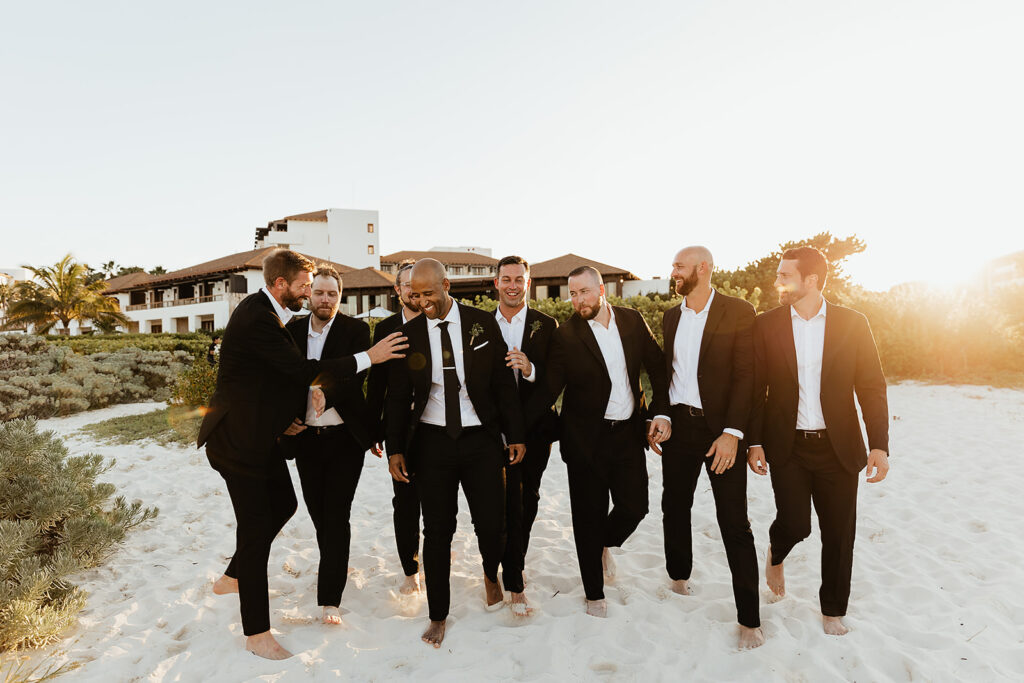 Groom and groomsman cancun elopement destination beach wedding photos 