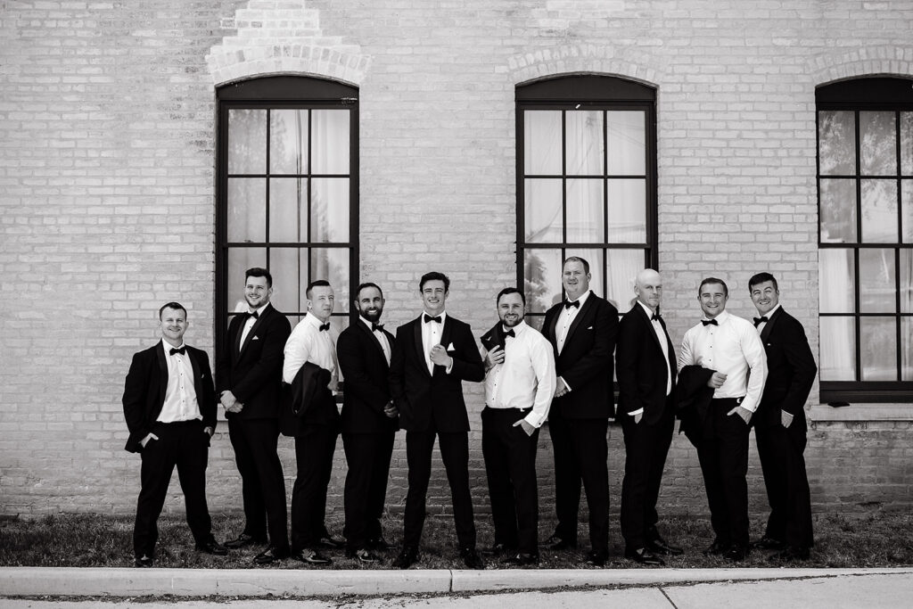 Groom and groomsmen portraits from Journeyman Distillery wedding captured by Michigan Wedding Photographer - Kim Kaye Photography