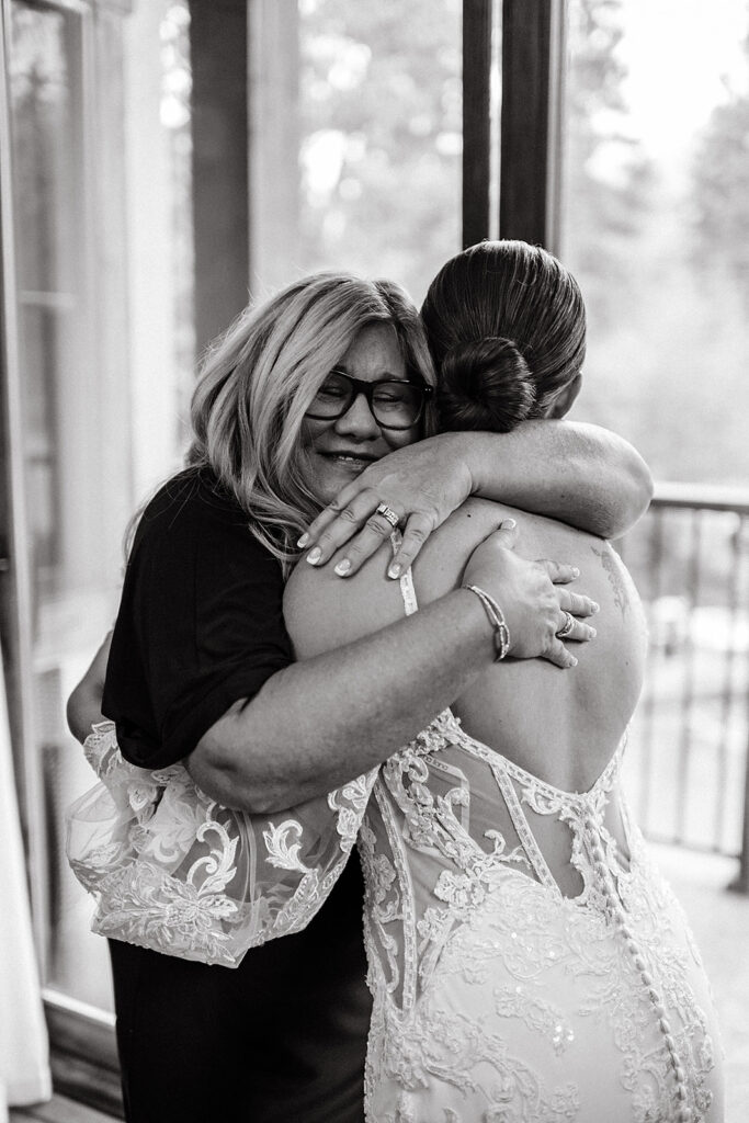 Bride hugging her mother