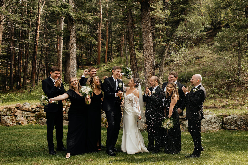 Wedding party posing for portraits from an Estes Park elopement in Colorado