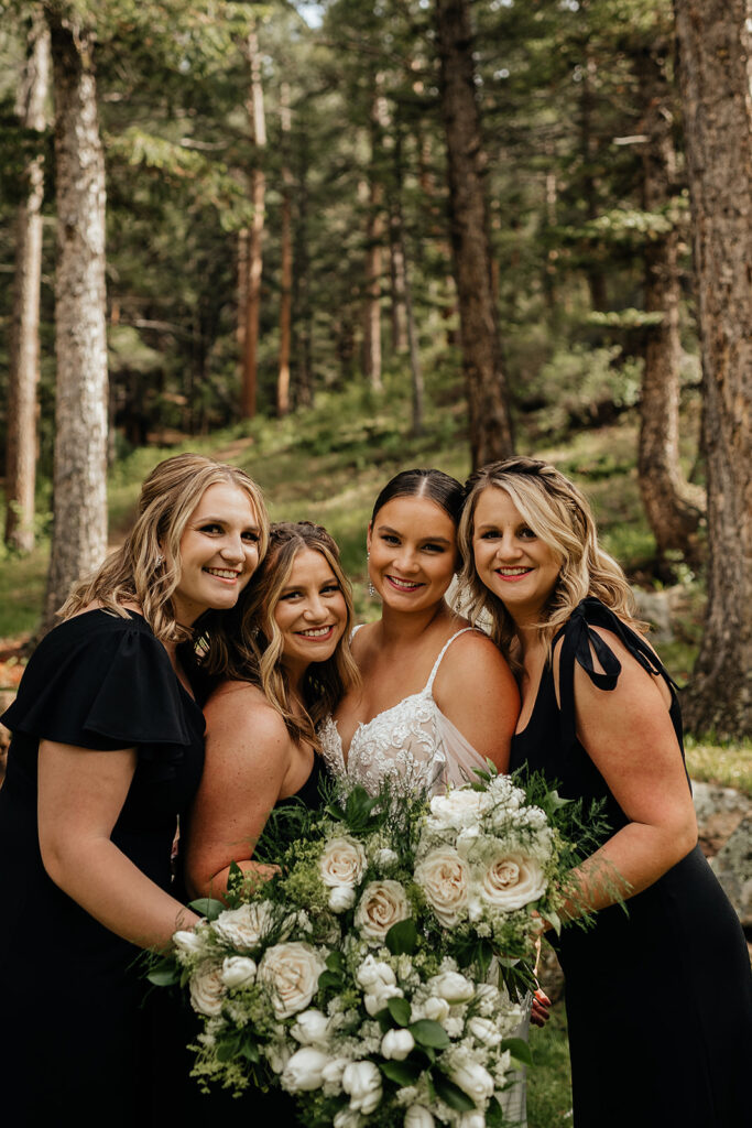 Bride and bridesmaids posing for portraits