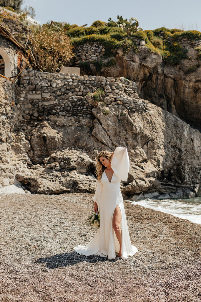 Bride posing for portraits during destination wedding in Italy