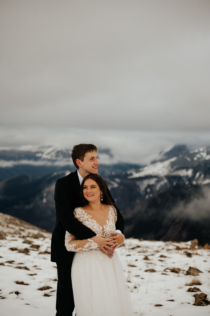 Couple posing for portraits from an Estes Park elopement in Colorado