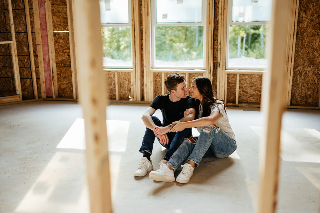 couples photoshoot inside home they are building