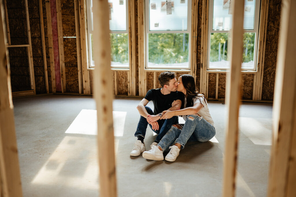 couples photoshoot inside home they are building