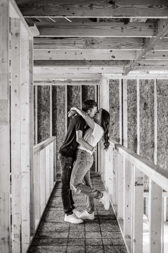 couple kissing in future home