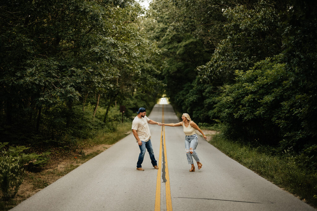 couple walking on the street in Indiana for engagement