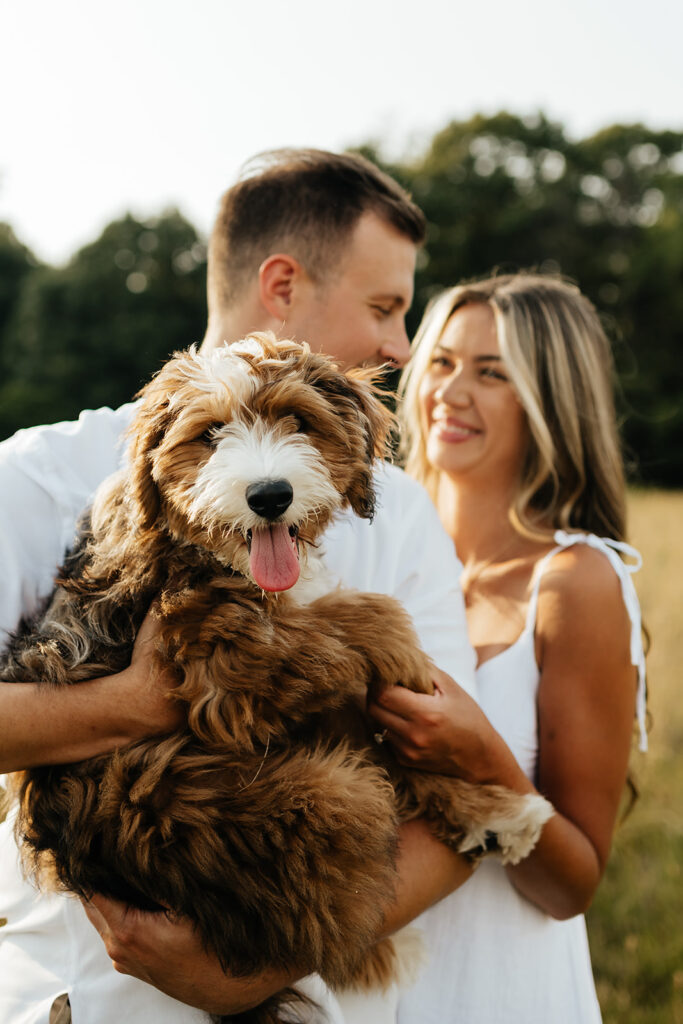 cute couple with dog engagement photos
