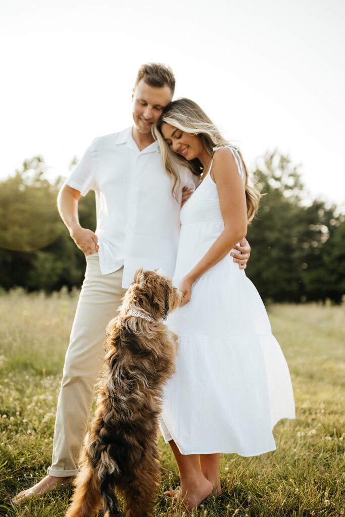 couple in Metea Park for engagement photos with their dog