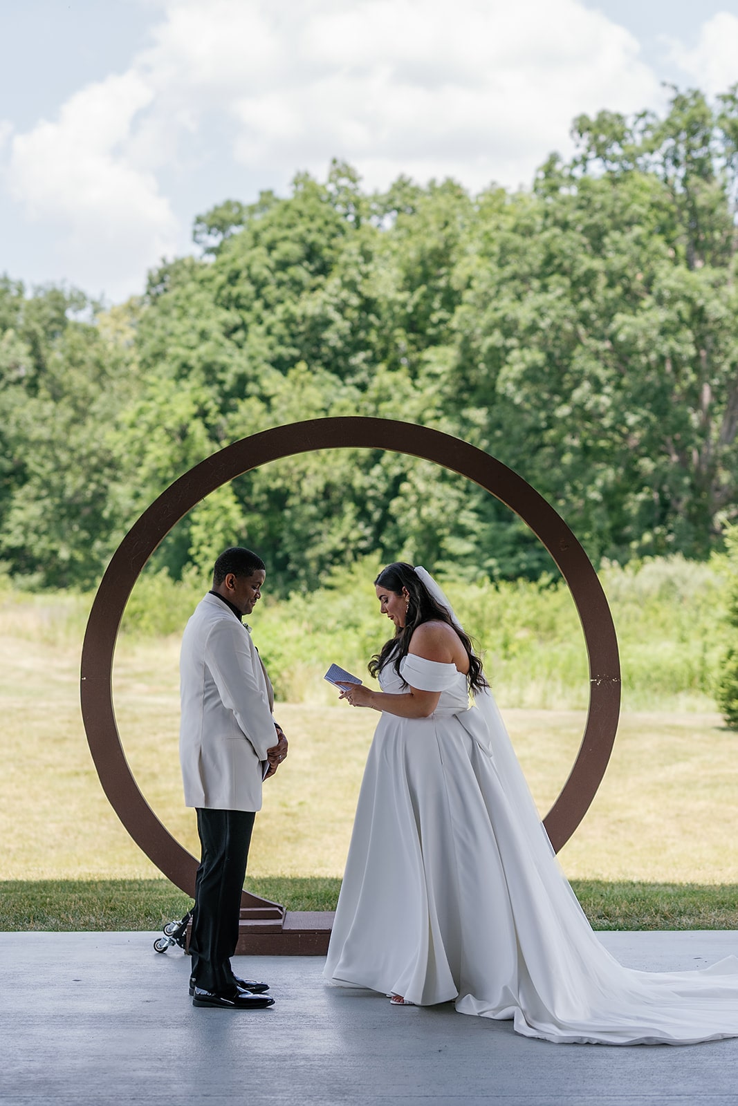 Bride and groom exchange personal vows at their Midwest wedding at Union 12