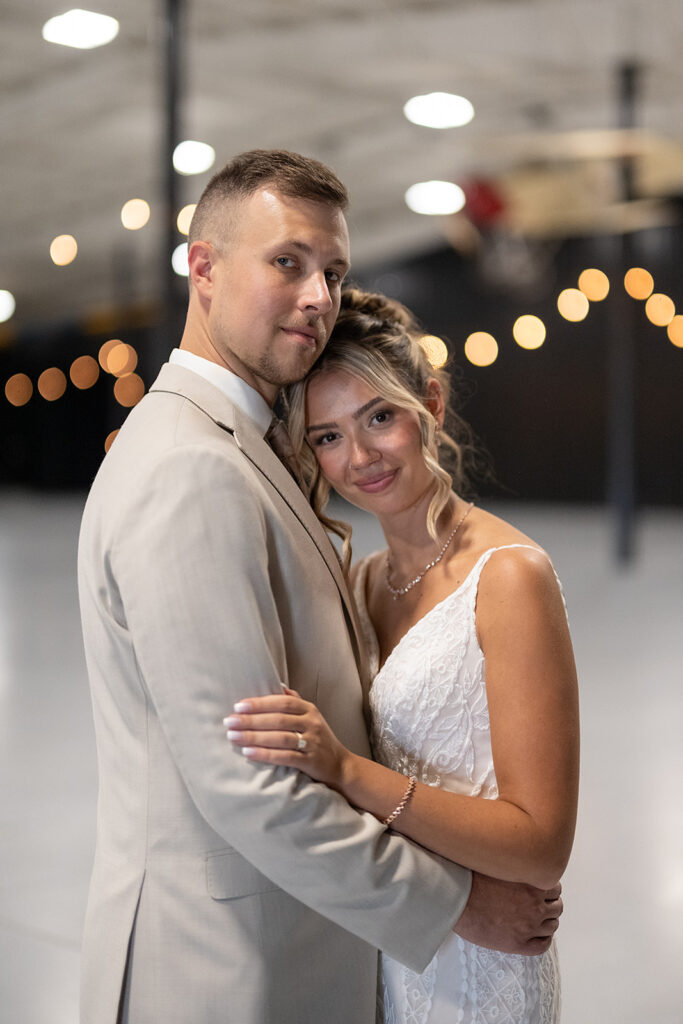 Bride and groom posing for their Indiana wedding portraits