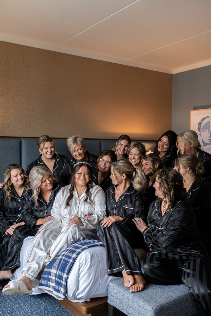 Bride and bridesmaids getting ready photos in matching pajama sets