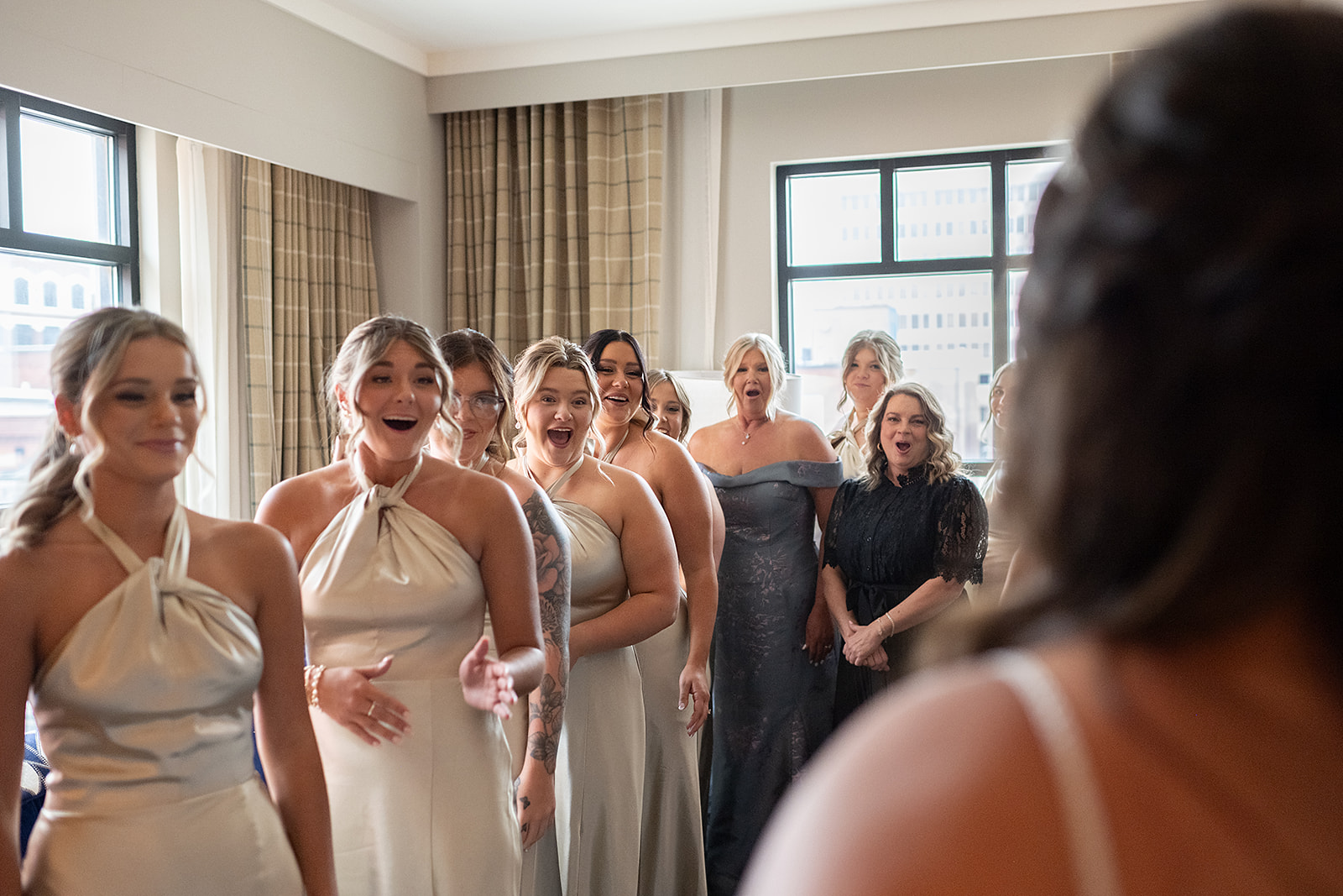 Bride sharing a first look with her bridesmaids