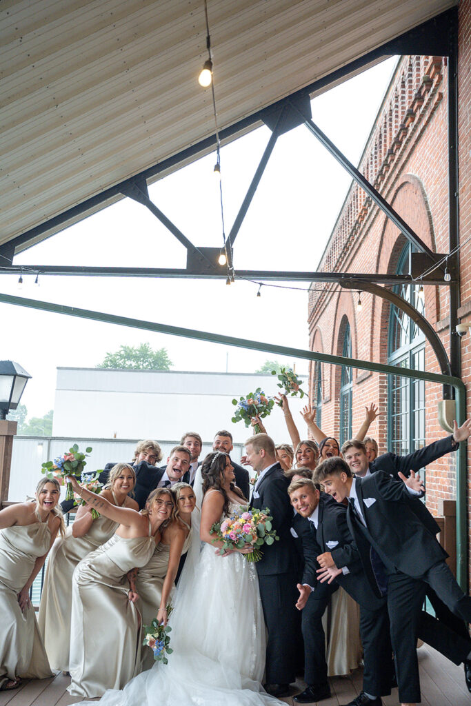 Full wedding party portraits from a downtown summer Fort Wayne wedding in Indiana