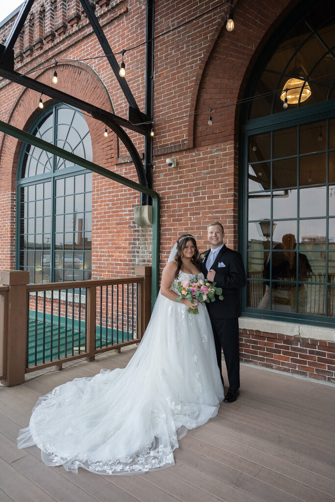 Outdoor bride and groom portraits from a downtown summer wedding in Fort Wayne, Indiana