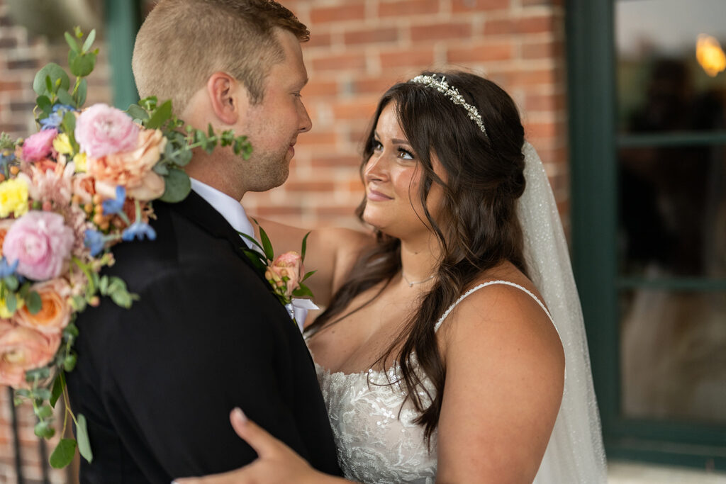 Outdoor bride and groom portraits from a downtown summer wedding in Fort Wayne, Indiana