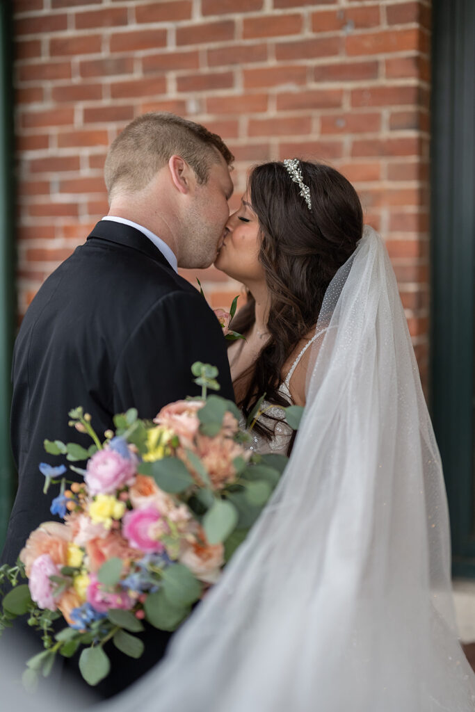 Outdoor bride and groom portraits from a downtown summer wedding in Fort Wayne, Indiana