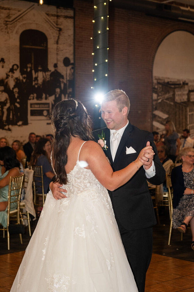 Bride and groom dancing during their indoor Fort Wayne wedding reception