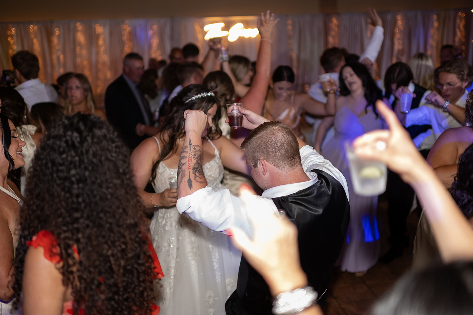 Bride and groom dancing during their Fort Wayne wedding reception