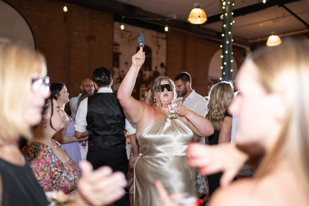 Bridesmaid dancing during a wedding reception