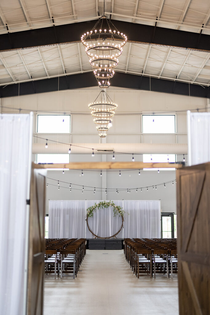 An indoor Kruse Plaza wedding ceremony in The Ballroom