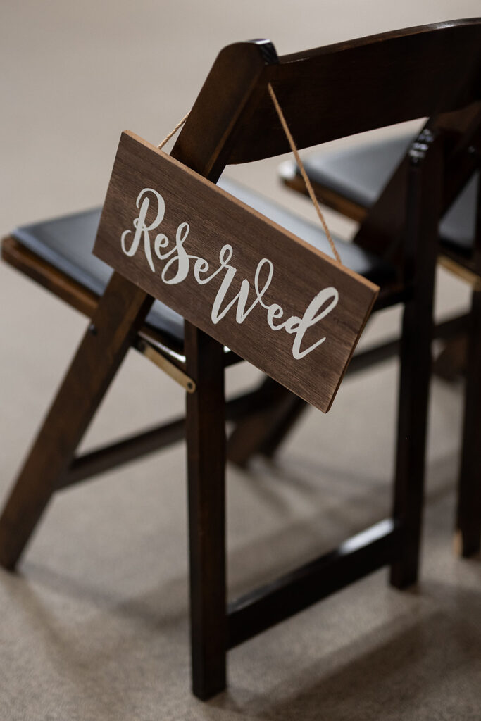 Reserved wedding seat sign