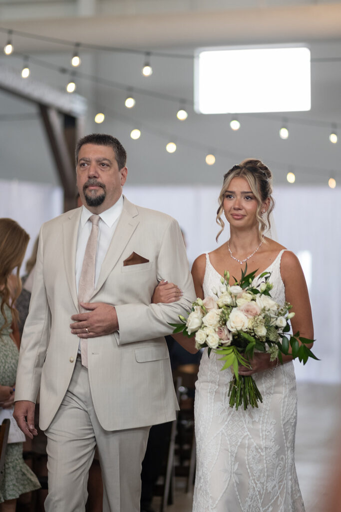 Bride getting emotional as she walks down the aisle