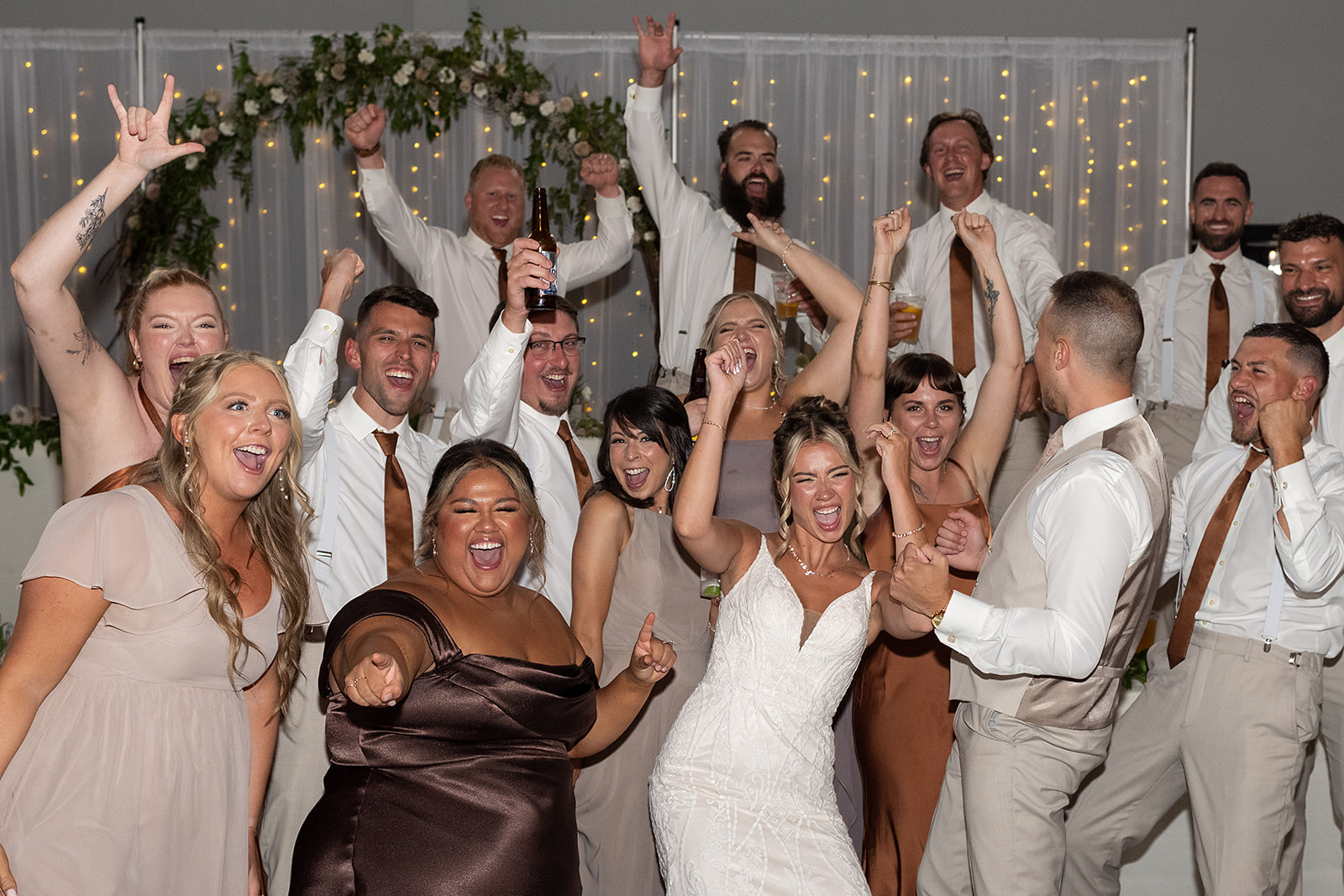 Bride and grooms group shot with their wedding parties