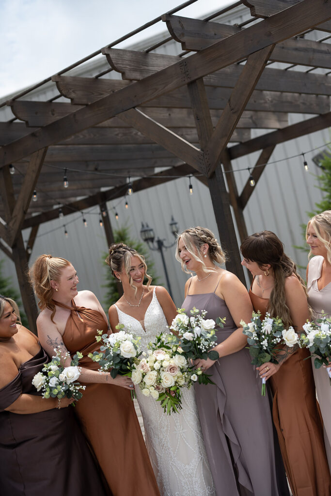 Bride and bridesmaids portraits from a Kruse Plaza wedding in Auburn. Indiana