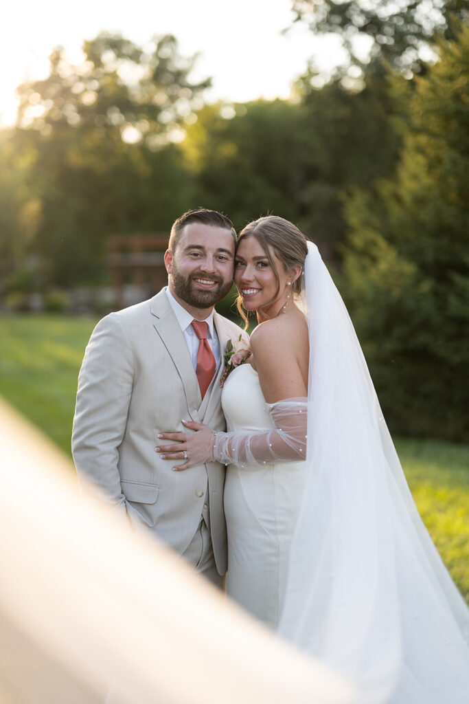 Bride and groom veil wedding photos