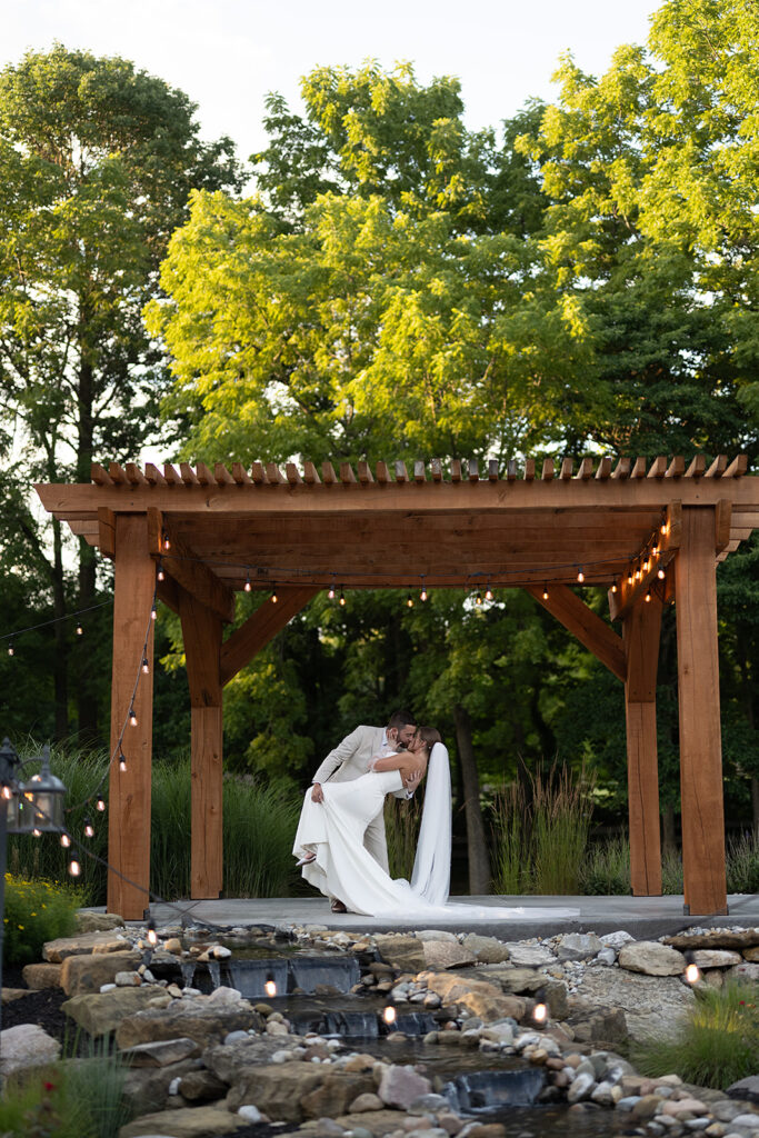 Outdoor bride and groom portraits at Stone Creek Lodge wedding venue in Crawfordsville, Indiana