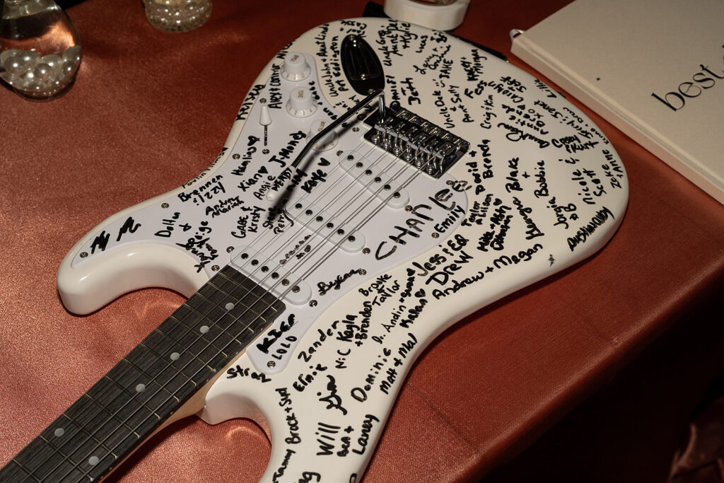 Guitar signed with wedding guests names