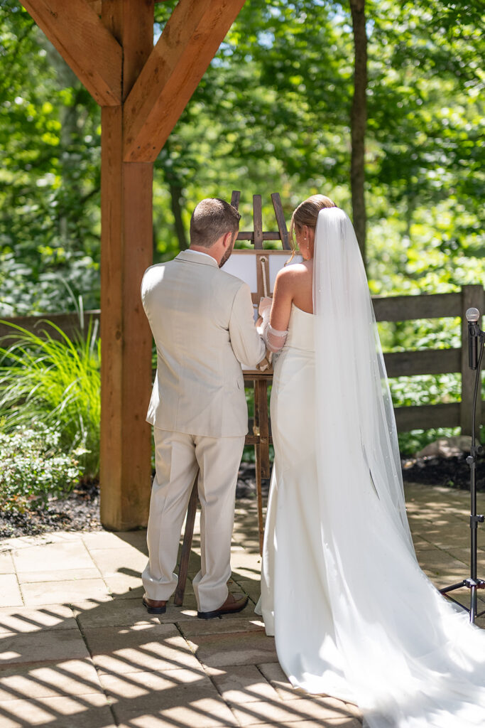 Bride and groom doing a knot tying ceremony