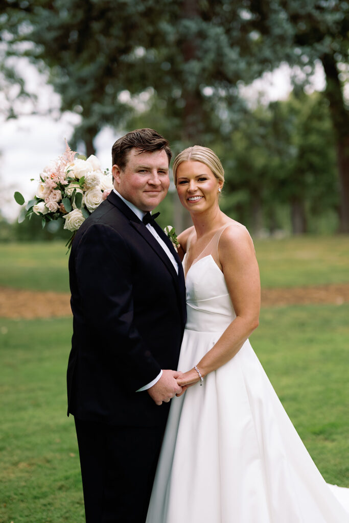 Bride and grooms outdoor wedding portraits from their River Forest Country Club wedding in Chicago