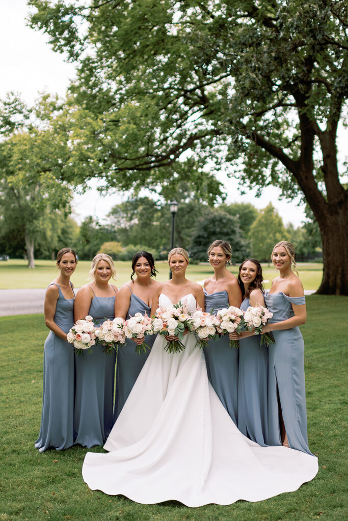 Outdoor bride and bridesmaids portraits from a River Forest Country Club wedding in Chicago