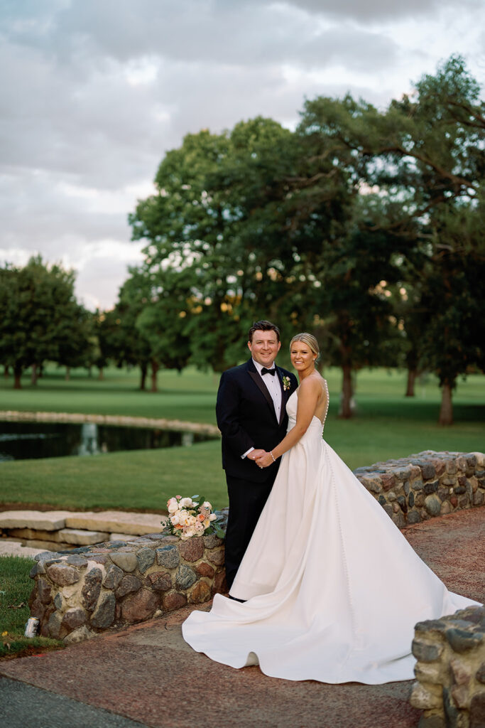 Outdoor bride and groom portraits at River Forest Country Club wedding venue in Chicago