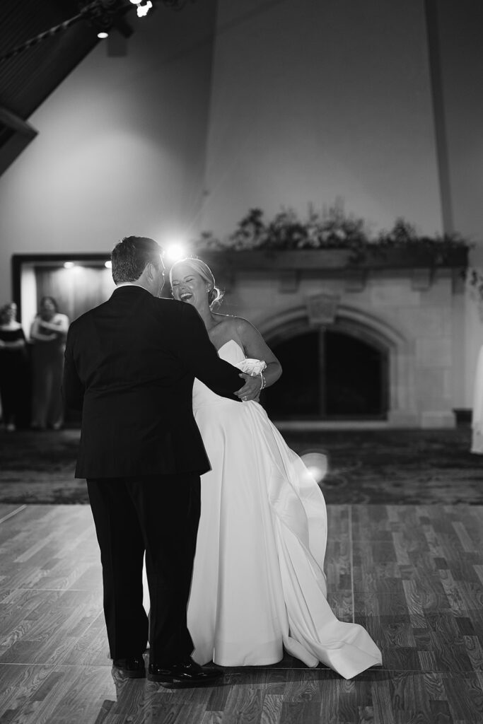 Black and white photo of a bride and grooms first dance during their River Forest Country Club wedding reception