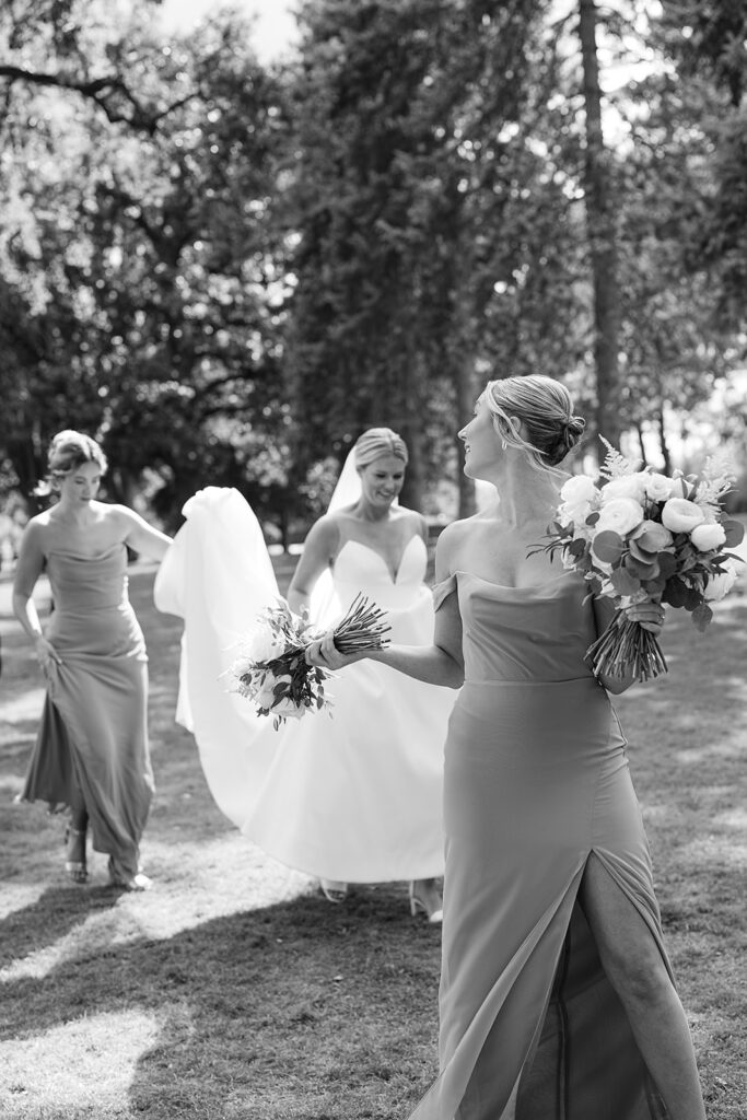 Black and white photo of a bride and her bridesmaids from a River Forest Country Club wedding in Chicago