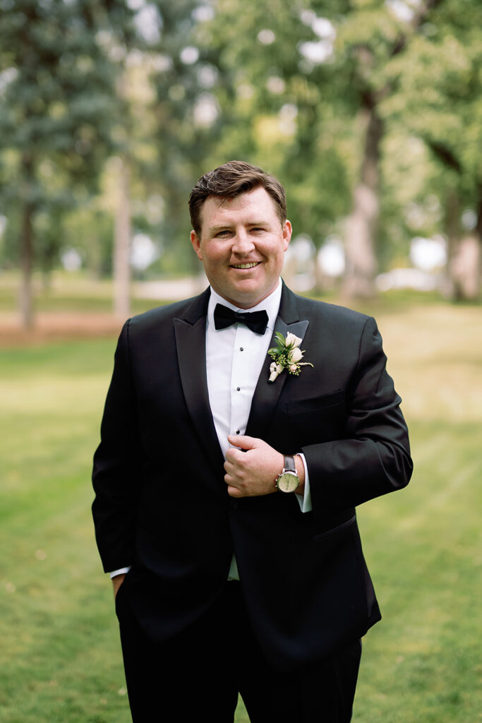 Outdoor grooms portraits from a River Forest Country Club wedding in Chicago