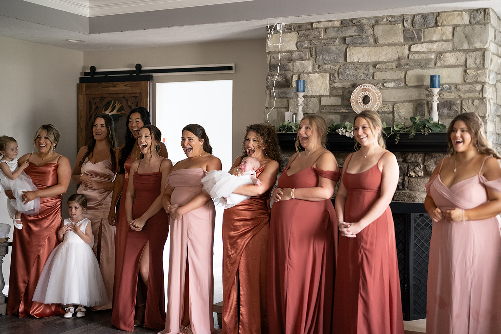 Bridesmaids reaction during their first look with the bride