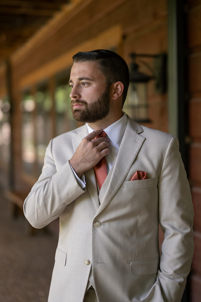 Grooms portraits at Stone Creek Lodge wedding venue in Indiana