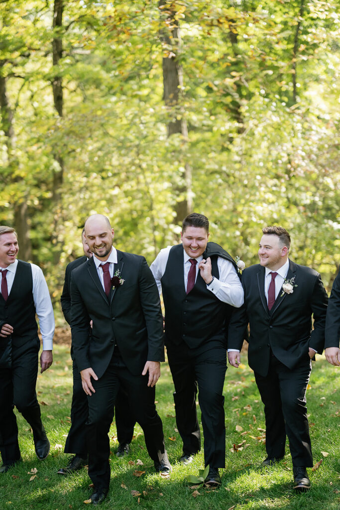 Outdoor fall groom and groomsmen portraits from a Rita Charles wedding in Indianapolis, Indiana