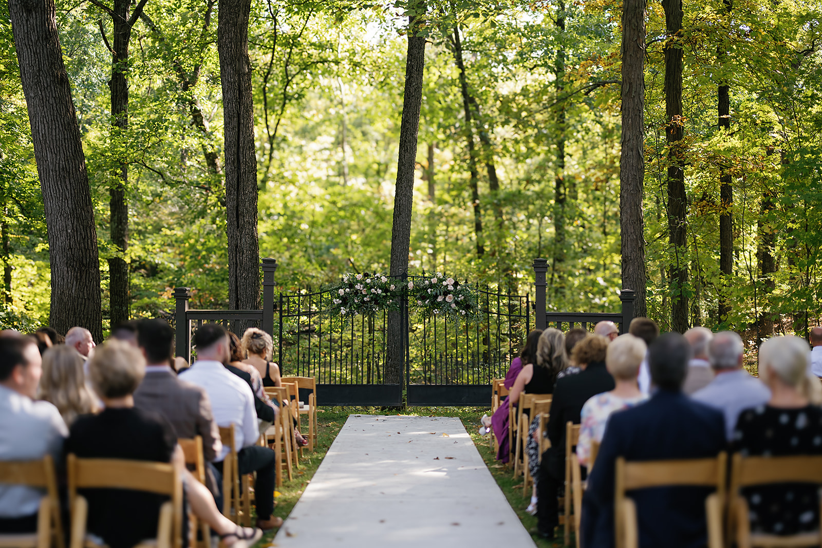 An outdoor fall Ritz Charles wedding ceremony in Indianapolis, Indiana