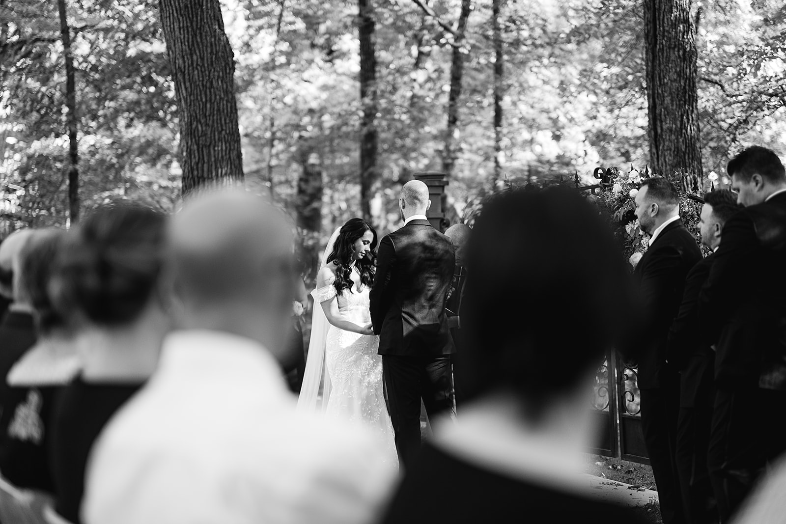 Black and white photo of a outdoor fall Ritz Charles wedding ceremony in Indianapolis, Indiana